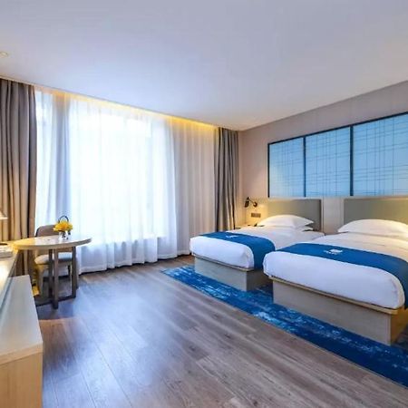 Echarm Hotel Ji'Nan Railway Station Цзинань Экстерьер фото