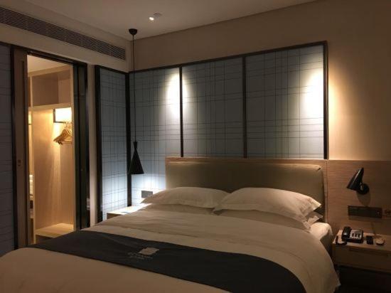 Echarm Hotel Ji'Nan Railway Station Цзинань Экстерьер фото